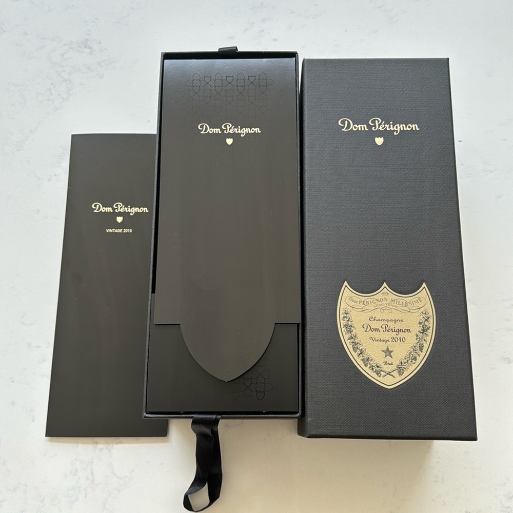 Dom Perignon packaging vintage 2010. Does NOT include bottle.